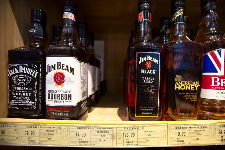 FILE - In this July 7, 2018 file photo whiskeys distilled and bottled in the U.S. are displayed for sale in a grocery store in Beijing.  AP Photo/Mark Schiefelbein, file)