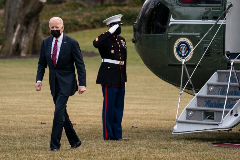 President Joe Biden arrives at the White House after visiting wounded troops and touring a COVID-19 vaccine center at Walter Reed National Military Medical Center, Friday.