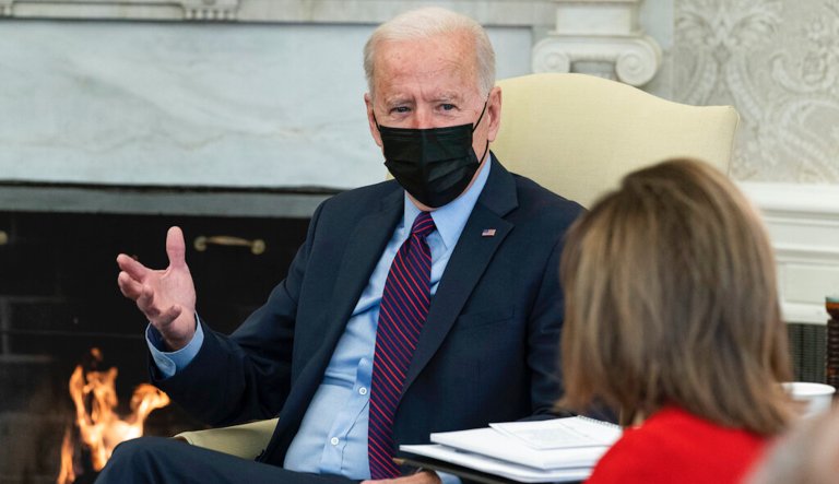 President Joe Biden speaks with House Speaker Nancy Pelosi of Calif., and other House Democratic Leaders in the Oval Office of the White House, Friday, Feb. 5, 2021, in Washington.