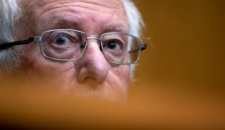 Bernie Sanders turns up heat on Biden after minimum wage setback