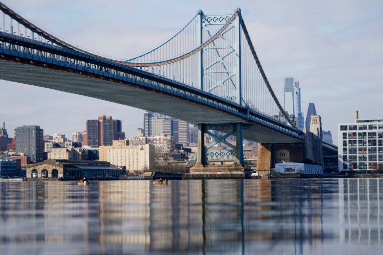This Feb. 10, 2021 file photo shows the Philadelphia side of the Benjamin Franklin Bridge spanning the Delaware River.