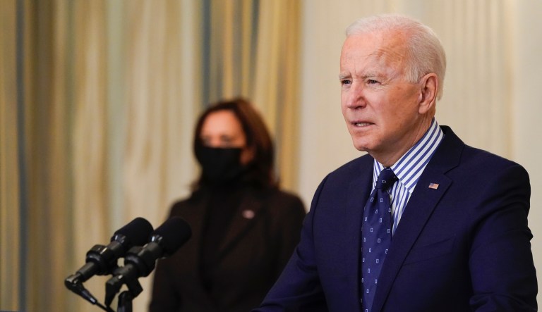 Vice President Kamala Harris, listens as President Joe Biden speaks in the State Dining Room of the White House, Saturday, March 6, 2021, in Washington. TheÂ Senate approvedÂ a sweeping pandemic relief package over Republican opposition on Saturday, moving Biden closer to a milestone political victory that would provide $1,400 checks for most American and direct billions of dollars to schools, state and local governments, and businesses.