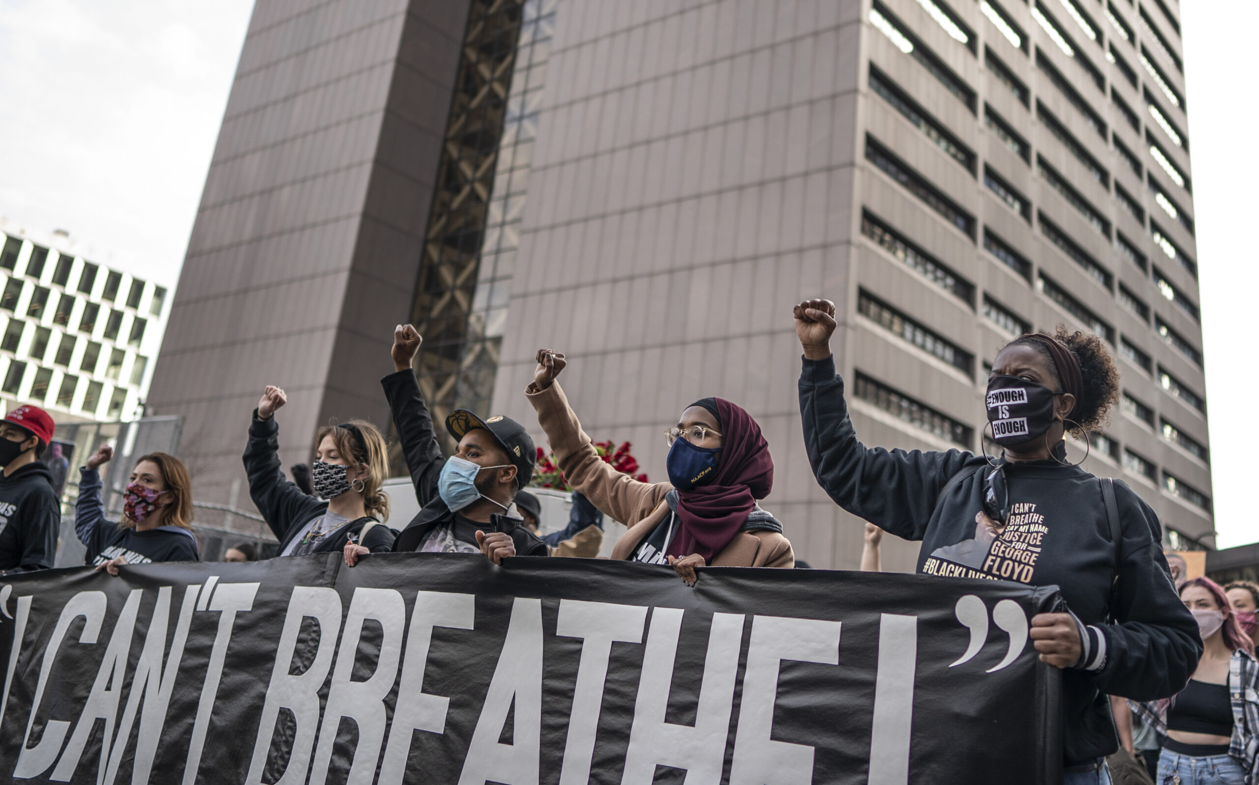 Demonstrators take to the streets, carrying casket in Minnesota on eve of Derek Chauvin trial