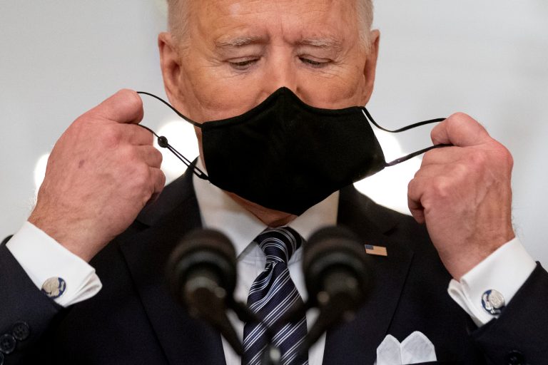 President Joe Biden takes off his mask to speak about the COVID-19 pandemic during a prime-time address Thursday.