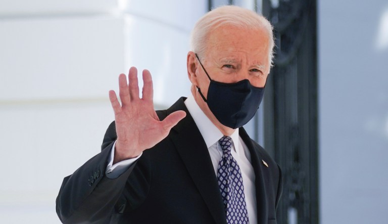 President Joe Biden waves before boarding Marine One on the South Lawn of the White House in Washington, Friday, March 19, 2021, for a short trip to Andrews Air Force Base, Md., and then on to Atlanta.