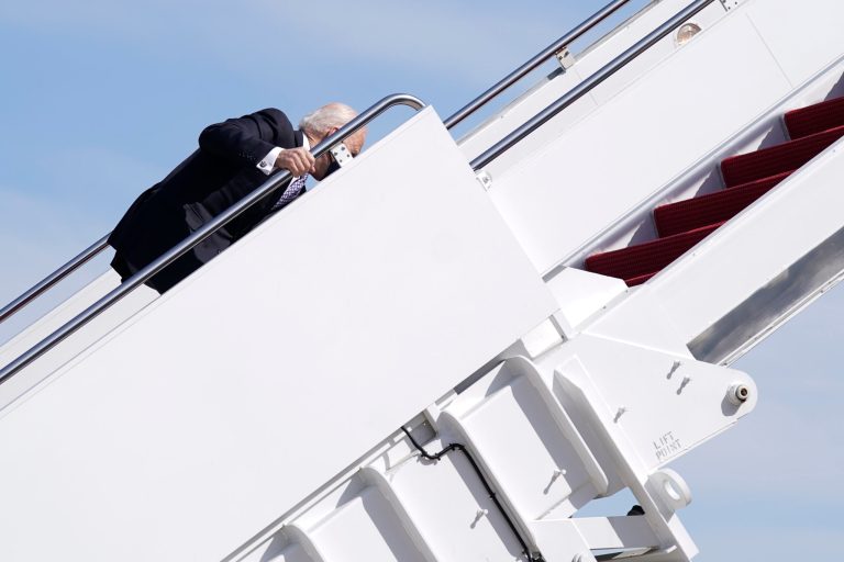 Biden stumbles up steps of Air Force One months after breaking foot