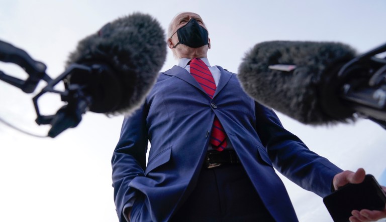 President Joe Biden talks to members of the press before boarding Air Force One on departure from John Glenn Columbus International Airport, Tuesday, March 23, 2021, in Columbus, Ohio.