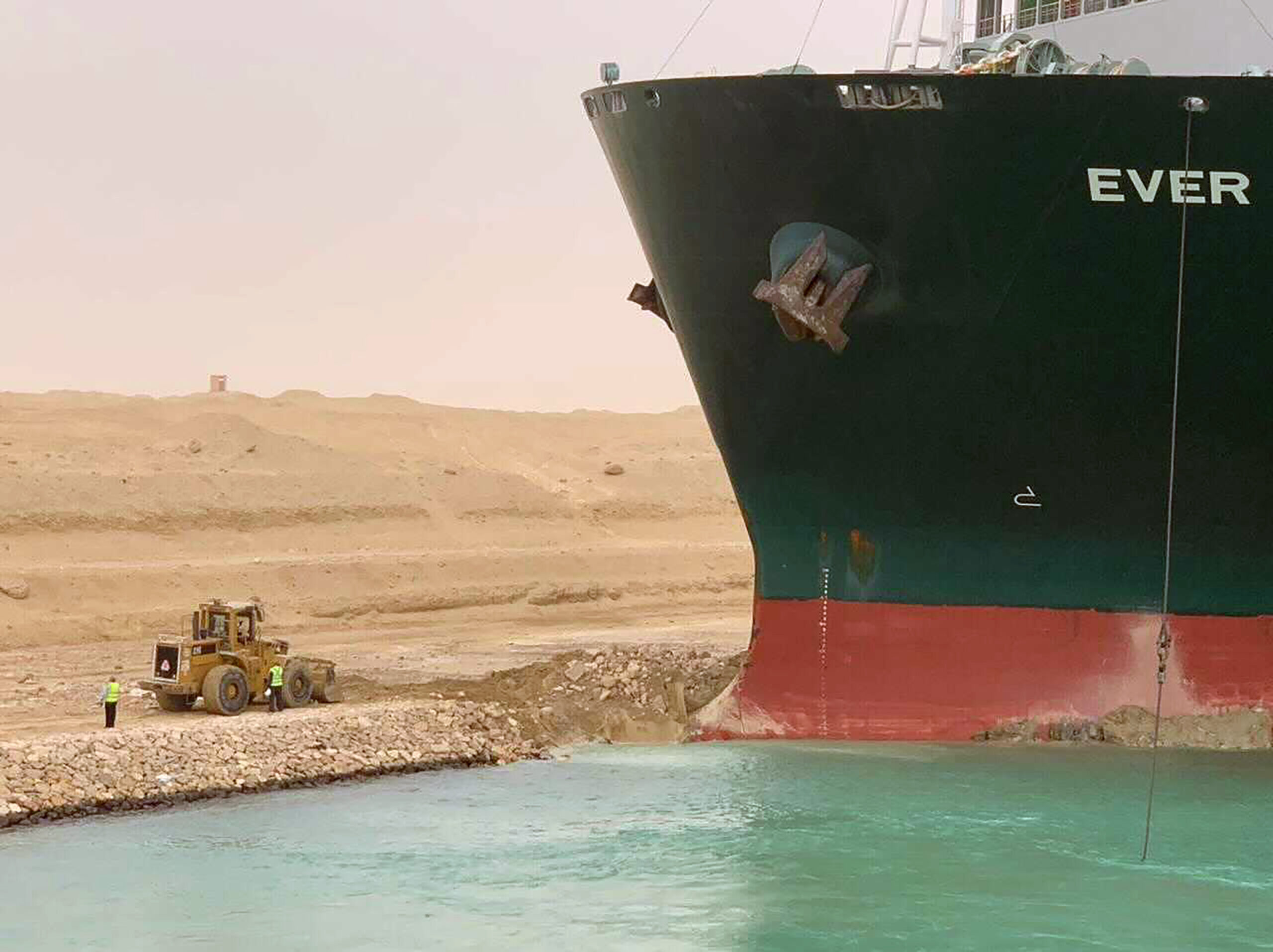 Ship wedged in Suez Canal could take weeks to move as it costs $9.6 billion per day in lost traffic