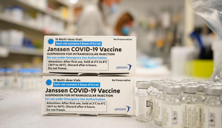 Boxes stand next vials of Johnson and Johnson COVID-19 vaccine in the pharmacy of National Jewish Hospital for distribution early Saturday, March 6, 2021, in east Denver. Volunteers worked with nurses and physicians from National Jewish to administer 2,500 vaccinations of the Johnson and Johnson vaccine that requires a single shot instead of two like the other vaccines.