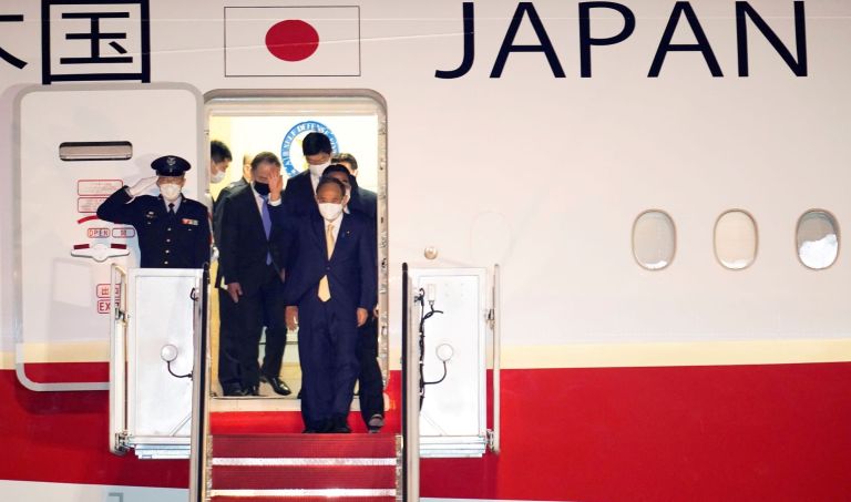 apanese Prime Minister Yoshihide Suga arrives at Andrews Air Force Base, Md., Thursday, April 15, 2021. Suga will be the first foreign leader to have a face-to-face meeting with President Joe Biden.