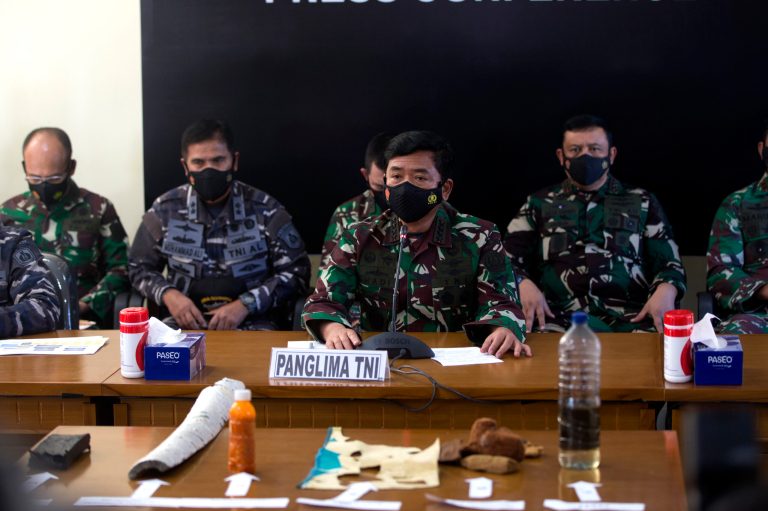 Indonesian navy finds debris from submarine, believes it cracked