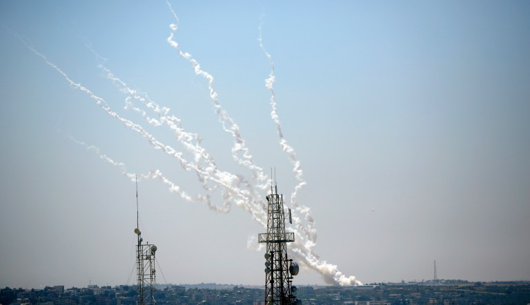 Rockets are launched from Gaza Strip to Israel, Thursday, May 13, 2021. Israel is pressing ahead with a fierce military offensive in the Gaza Strip. It killed multiple senior Hamas military figures Wednesday and toppled a pair of high-rise towers housing Hamas facilities.