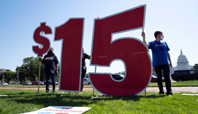 Demonstrators rally at the Capitol in support of McDonald's workers on strike to be paid $15 per hour in 15 cities on Capitol Hill in Washington, Wednesday, May 19, 2021.
