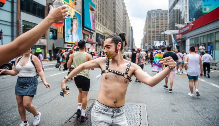 Amid Iravanipour dancing in the street at the Queer Liberation March on Sunday, June 27, 2021, in New York.