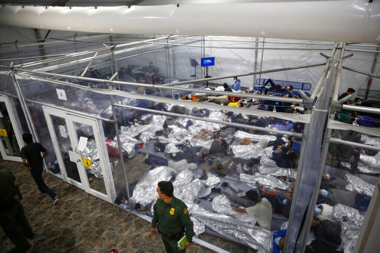 Minors lie inside a pod at a Department of Homeland Security holding facility in Donna, Texas.