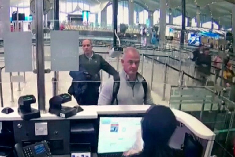 FILEâ This Dec. 30, 2019 image from security camera video shows Michael L. Taylor, center, and George-Antoine Zayek at passport control at Istanbul Airport in Turkey (DHA via AP, File)