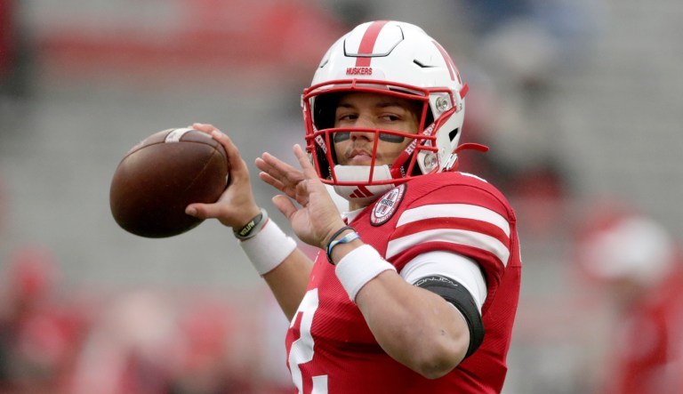 Nebraska quarterback Adrian Martinez (2) warms up before an NCAA college football game against Iowa in Lincoln, Neb., Friday, Nov. 29, 2019.