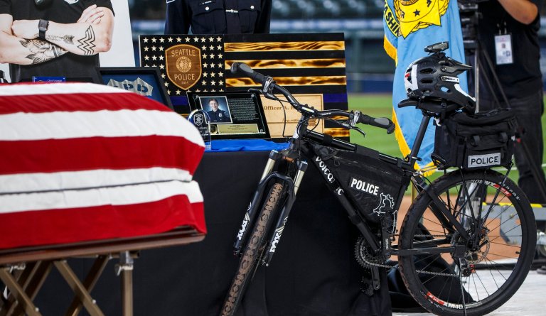 Seattle police officer Alexandra âLexiâ Harrisâ bike she used on patrol is shown at her memorial service at T-Mobile Park on Thursday, July 1, 2021. Harris was hit by a driver and killed when she stopped to help at a car crash scene. 

OUTS: SEATTLE OUT, USA TODAY OUT, MAGAZINES OUT, ONLINE OUT, TELEVISION OUT, SALES OUT. MANDATORY CREDIT TO:  Amanda Snyder / THE SEATTLE TIMES.