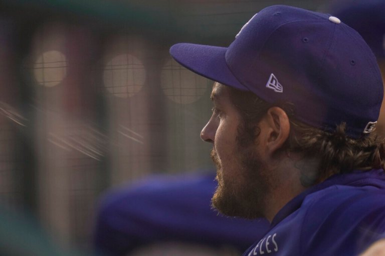 Los Angeles Dodgers starting pitcher Trevor Bauer looks on from the dugout during the fourth inning of a baseball game against the Washington Nationals, Thursday, July 1, 2021, in Washington.