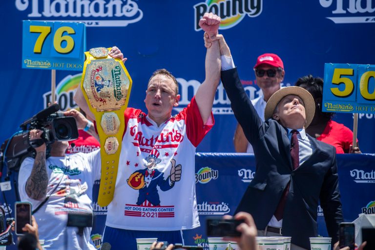 Chowdown champ Joey âJawsâ Chestnut celebrates after winning the Nathan's Famous Fourth of July International Hot Dog-Eating Contest in Coney Island's Maimonides Park on July 4, 2021, in the Brooklyn borough of New York. 