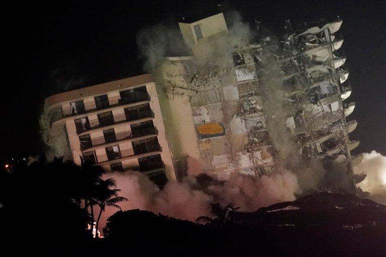 Explosives set off to bring down rest of collapsed condo