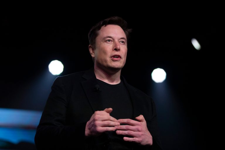 In this March 14, 2019, file photo, Tesla CEO Elon Musk speaks before unveiling the Model Y at the company's design studio in Hawthorne, Calif. In the runup to Tesla Inc.âs 2016 acquisition of SolarCity, Elon Musk called the combination a âno brainer,â a one-stop shop for electric cars and the solar panels to recharge them. On Monday, July 12, 2021, the Tesla CEO will have to defend the $2.5 billion deal under oath in a shareholder lawsuit alleging conflicts of interest.