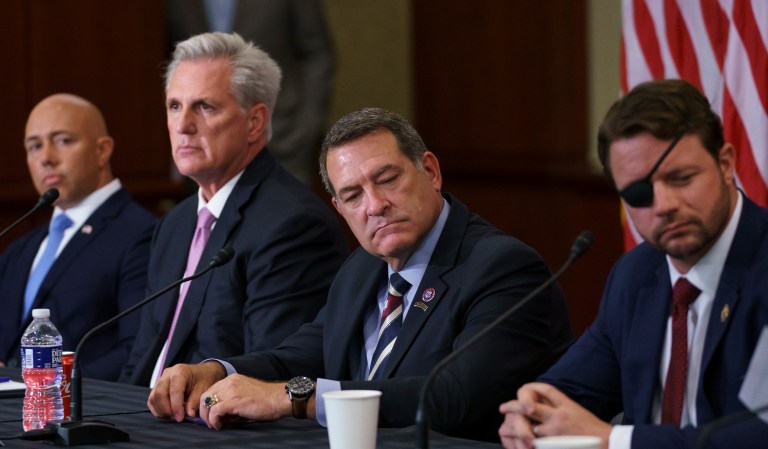 House Republicans, from left, Rep. Brian Mast, R-Fla., House Minority Leader Kevin McCarthy, R-Calif., Rep. Mark Green, R-Tenn., and Rep. Dan Crenshaw, R-Texas, gather for a roundtable discussion to criticize President Joe Biden on the Afghanistan evacuation, at the Capitol in Washington, Monday, Aug. 30, 2021.