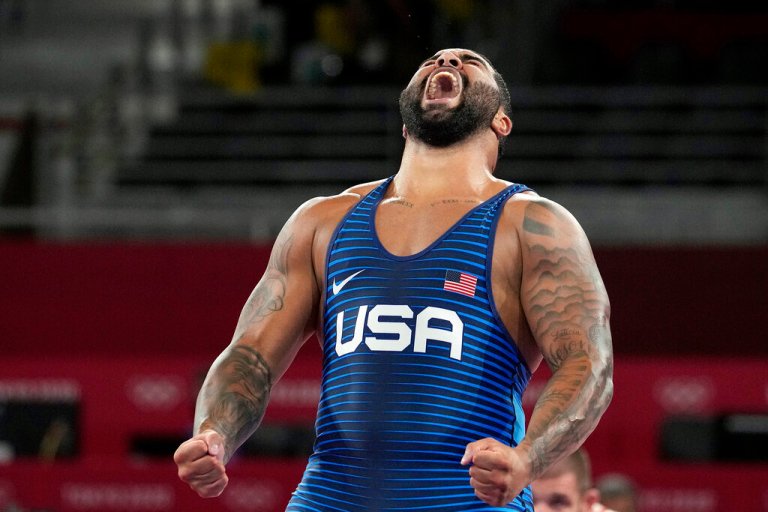 Gable Steveson celebrates after defeating Georgia's Gennadij Cudinovic during their men's freestyle 125kg wrestling final match at the 2020 Summer Olympics in Chiba, Japan.