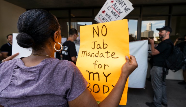 Anti-vaccine mandate protesters rally outside the front doors of the Los Angeles Unified School District, LAUSD headquarters in Los Angeles Thursday Sept. 9, 2021.