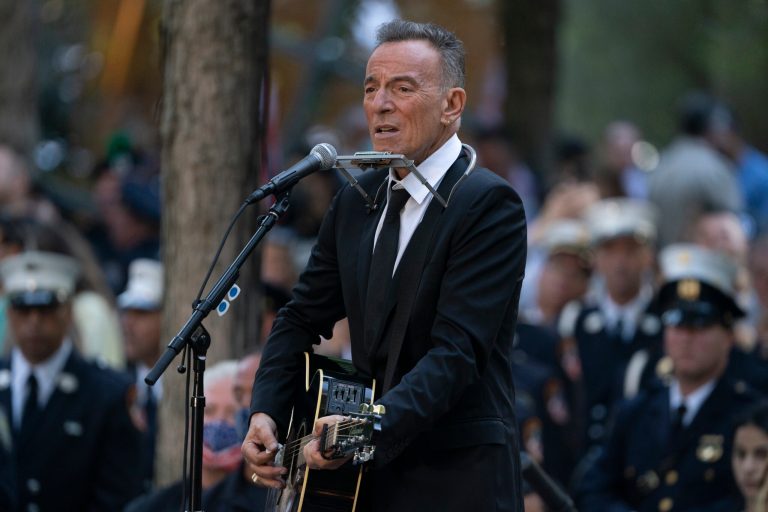 Bruce Springsteen performs during ceremonies to commemorate the 20th anniversary of the Sept. 11 terrorist attacks.
