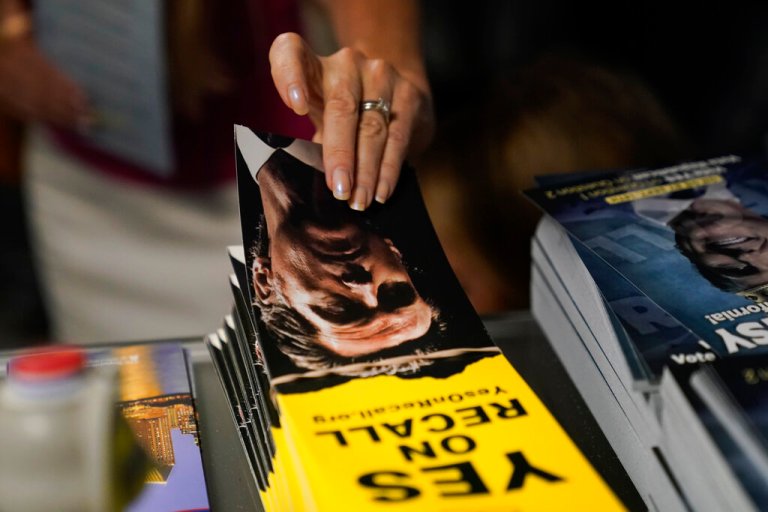 Frustrated LA voters given provisional ballots after equipment glitch in recall election