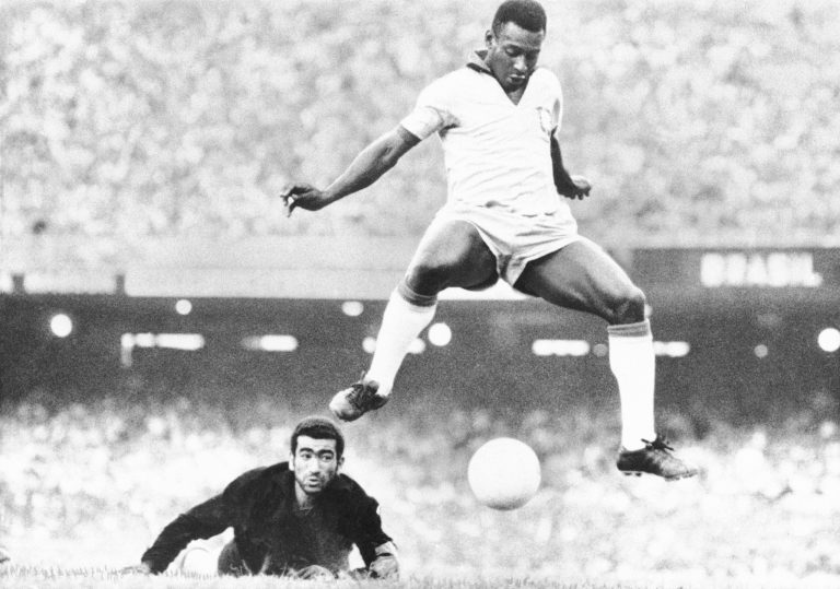 Brazil's PelÃ© scores past Venezuela's goal keeper, Fabrizio Fasano, in Rio de Janeiro, Brazil, Aug. 24, 1969. PelÃ©, the Brazilian king of soccer who won a record three World Cups and became one of the most commanding sports figures of the last century, died in Sao Paulo on Dec. 29, 2022. He was 82. 
