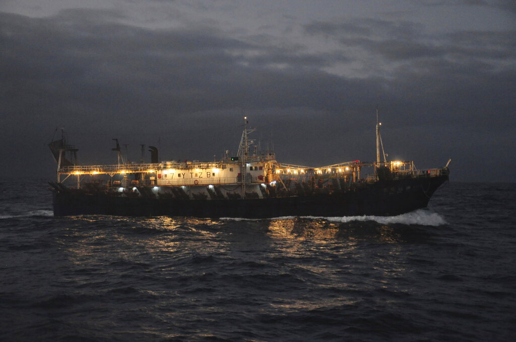 Green sky lit by Chinese squid boats spooks Taiwanese