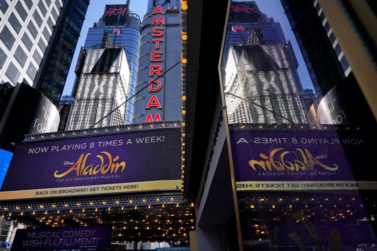 The marquee of the New Amsterdam theater appears in New York, Thursday, Sept. 30, 2021. The hit Broadway show 