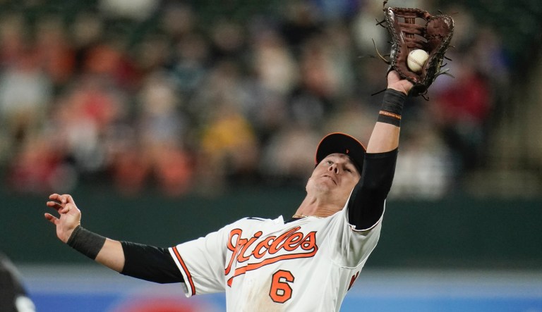 Baltimore Orioles first baseman Ryan Mountcastle catches a fly ball by Boston Red Sox's Jose Iglesias during the seventh inning of a baseball game, Thursday, Sept. 30, 2021, in Baltimore.