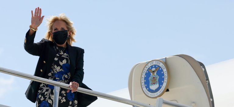 FILE - In this Sept. 15, 2021 file photo, First lady Jill Biden waves before boarding a plane at General Mitchell International Airport in Milwaukee, Wis. (Evelyn Hockstein/Pool via AP, File)