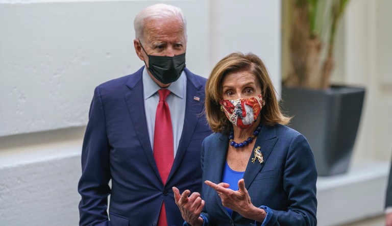President Joe Biden and Speaker of the House Nancy Pelosi, D-Calif., talk in a basement hallway of the Capitol after meeting with House Democrats to rescue his his $3.5 trillion government overhaul and salvage a related public works bill, in Washington, Friday, Oct. 1, 2021.