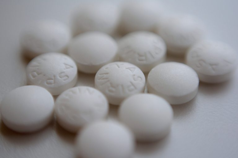 This Aug. 23, 2018 file photo shows an arrangement of aspirin pills in New York. Older adults without heart disease should not take daily aspirin to prevent a first heart attack or stroke. That's according to preliminary updated advice from an influential health guidelines group. The draft guidance posted online Tuesday, Oct. 12, 2021, by the U.S. Preventive Services Task Force backtracks a bit but puts the panel more in line with other medical groups. 