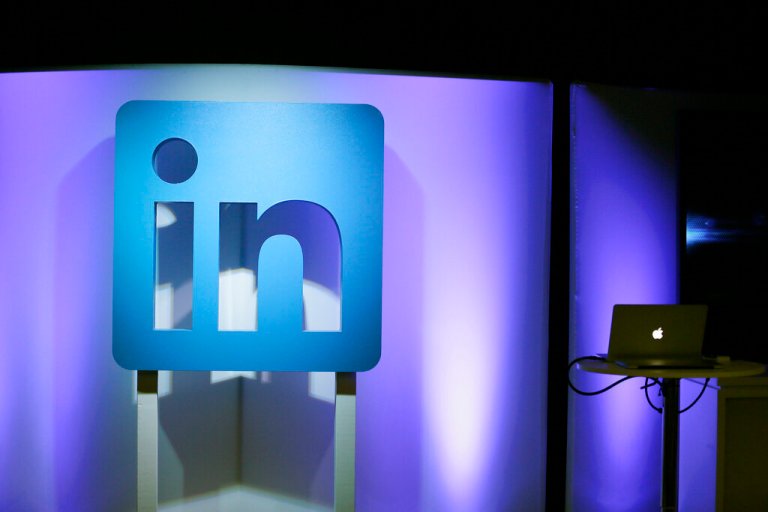 The LinkedIn logo is displayed during a product announcement in San Francisco. 