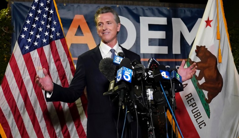 In this Sept. 14, 2021, file photo, California Gov. Gavin Newsom addresses reporters after beating back the recall attempt that aimed to remove him from office, in Sacramento, Calif. After surviving the attempted recall Newsom signed into law 92% of the bills lawmakers sent him at the end of the years legislative session that ended Sept. 10.