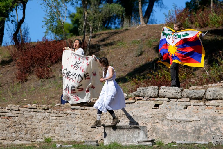 ‘No genocide games’: Activists protest torch-lighting for 2022 Beijing Winter Olympics