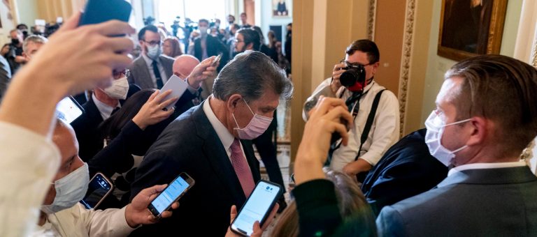 Exchange between Manchin and Sanders gets tense in closed-door meeting on spending bill