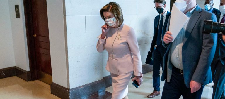 After Biden meeting, Pelosi calls spending bill deal within sight