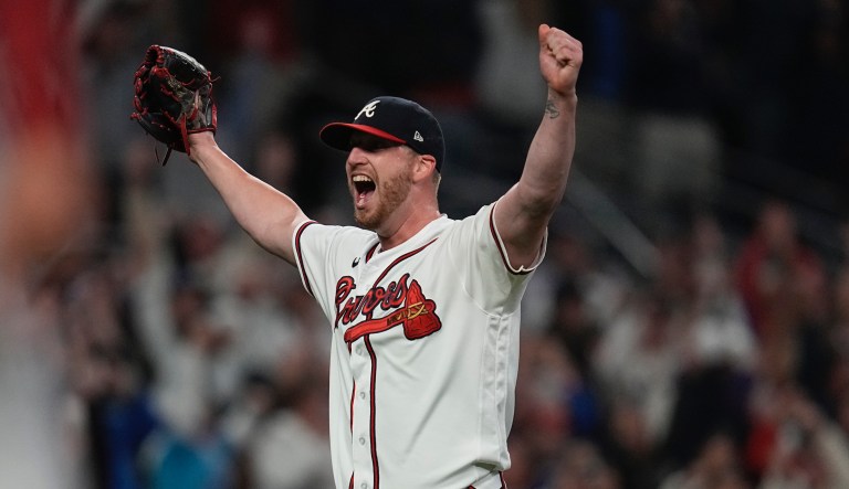 Atlanta Braves relief pitcher Will Smith celebrates after winning Game 6 of baseballâs National League Championship Series against the Los Angeles Dodgers Sunday, Oct. 24, 2021, in Atlanta. The Braves defeated the Dodgers 4-2 to win the series.