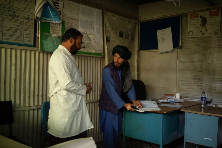 In Afghan hospital, unpaid doctors and rigid Taliban clash