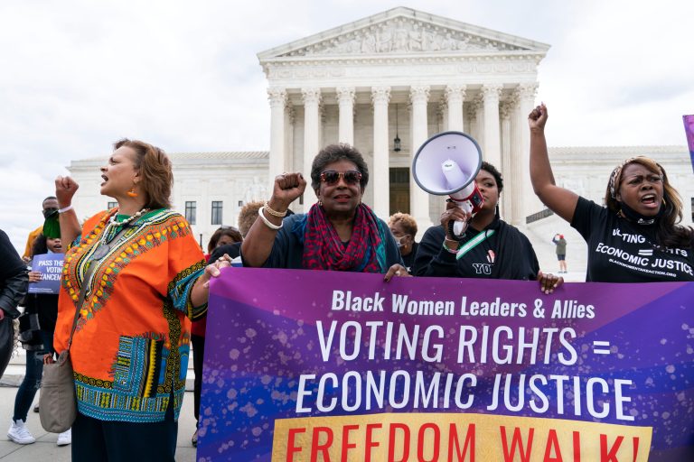 Demonstrators protest during a voting rights rally at the Supreme Court Thursday, Oct. 28, 2021, in Washington.