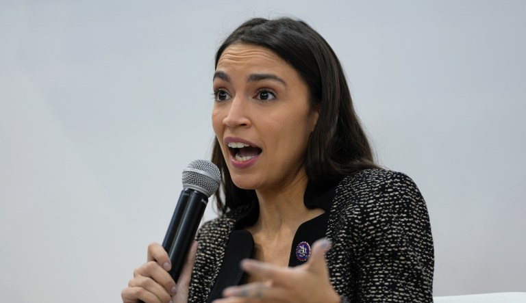 U.S. Rep. Alexandria Ocasio-Cortez speaks at an event at the US Climate Action Center at the COP26 U.N. Climate Summit in Glasgow, Scotland, Tuesday, Nov. 9, 2021. The U.N. climate summit in Glasgow has entered it's second week as leaders from around the world, are gathering in Scotland's biggest city, to lay out their vision for addressing the common challenge of global warming.