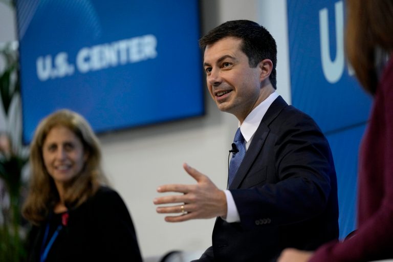 Mayor Pete Buttigieg, of South Bend, Indiana, smiles as he listens to a question during a stop in Raymond, N.H., Saturday, Feb. 16, 2019. 