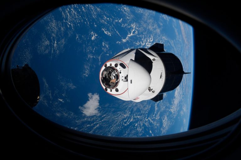 In this April 24, 2021 file photo made available by NASA, the SpaceX Crew Dragon capsule approaches the International Space Station for docking.