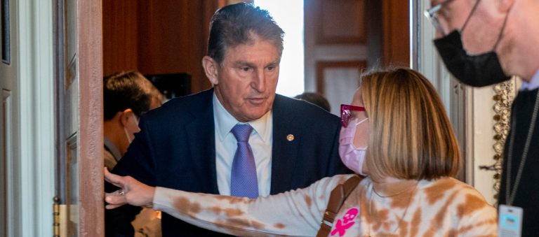 Manchin signals he is open to vote on social spending bill before the end of the year